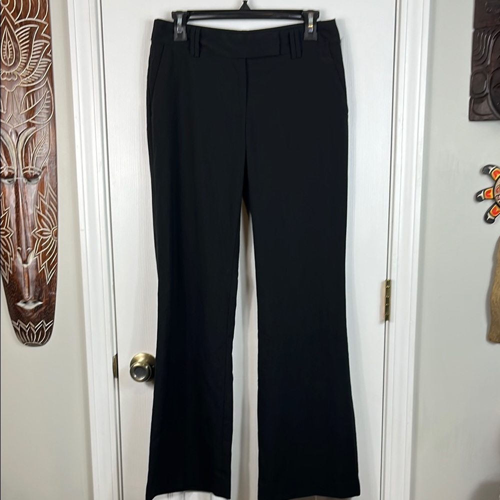 Loft black pants size 2. 64 polyester, 34 rayon, 2 spandex. Pockets.
